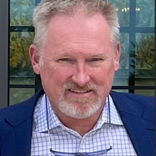 Dr. John Noble, President & CEO